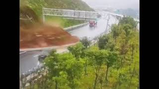 Shandong China  July 29 2024  landslide suddenly occurred on a highway nearly hitting a car [upl. by Bondy104]