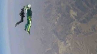 Skydiver Luke Aikins sets record for highest jump without parachute [upl. by Anerda320]