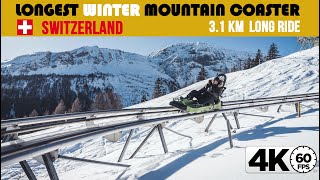 Switzerland LONGEST Mountain Coaster • Winter RIDE 4K 60fps video [upl. by Desdee]