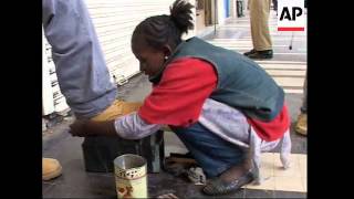 Ethiopian girl pays for education by shining shoes [upl. by Fabian]