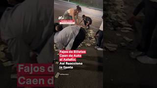 Fajos de billetes caen de auto al asfalto Así reacciona la gente  N Shorts [upl. by Myron206]