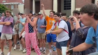 Ole Miss counterprotester appears to make monkey noises at Black woman [upl. by Eltsyrc]