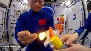 Chinese astronauts light candle with match on Tiangong space station to show flame behavior [upl. by Aneez]