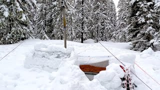 Winter Camping In Snow Shelter During A Storm [upl. by Aenet878]