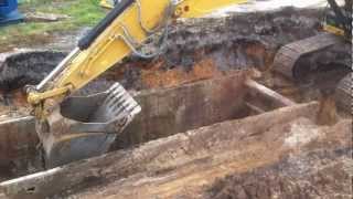 Caterpillar 336E excavator digging for storm pipe [upl. by Gleda295]