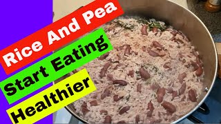 Jamaican Rice And Peas Recipe With Coconut Milk  Bob Marley Favorite Food [upl. by Eckmann210]