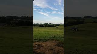 Mowing hay New Holland workmaster 75 [upl. by Enihsnus686]