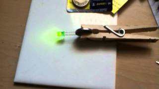 Make an LED light on a coin battery [upl. by Noella886]