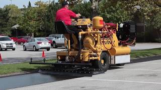 How to Sealcoat Asphalt Pavement  SealMaster [upl. by Inerney]