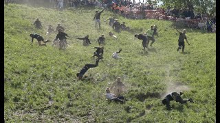 Thrills and spills as Cheese Rolling 2023 leads to MULTIPLE injuries in Gloucestershire UK [upl. by Michaella]