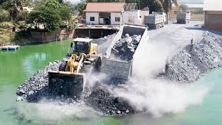 Processing Roads Foundation across the lake with Wheels loader SDLG amp A lot of Heavy dump trucks [upl. by Naitsirhk788]