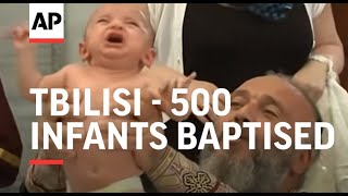 500 infants baptised in mass Orthodox ceremony [upl. by Unity]