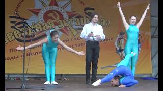 Contortionist performs with two acrobats and singer [upl. by Drofnats]