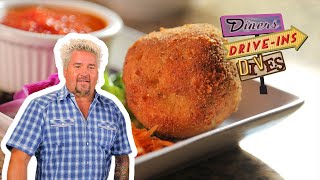 Guy Fieri Eats Luigis Arancini  Diners DriveIns and Dives  Food Network [upl. by Redienhcs]