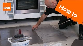 How to tile a floor part 2 laying the tiles [upl. by Cl]