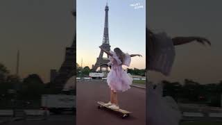 Parisian Sunrise Magic Woman Dances on Longboard in Flowing Dress [upl. by Leitnahs551]