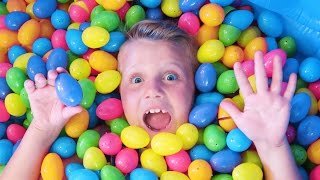 Giant Surprise Easter Egg Hunt POOL FIND THE GUMMI CANDY EGG Challenge Kyles Toys amp Games Fun [upl. by Girvin]