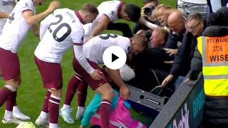 West Ham stars rescue ball boy after celebrating fans fall through advertising boards  Fall Moment [upl. by Assenay]