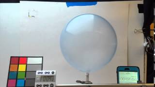 Breaking a Colorchanging Balloon in Slow Motion [upl. by Jacquetta]