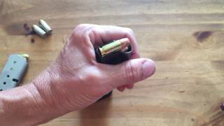 How to Load A SemiAuto Handgun Magazine [upl. by Ekrub367]