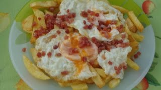 Receta huevos rotos con jamón [upl. by Adlesirhc291]