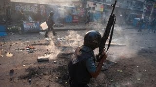 Dhaka police clash with Islamic activists [upl. by Nerdna950]