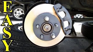 How to Replace Front Brakes Pads and Rotors [upl. by Lecram]