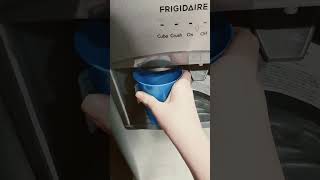 Frigidaire Ice dispenser on fridge demo [upl. by Ebbarta532]