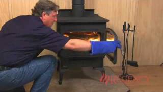 How to Light amp Maintain a Wood Stove Fire [upl. by Ojadnama]