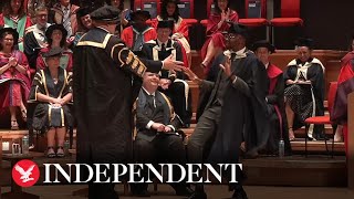 Student breaks into epic celebratory dance at graduation ceremony [upl. by Dracir]