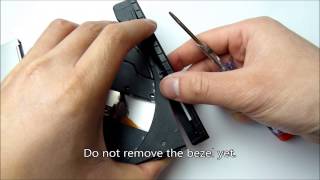 How to safely remove bezel  frontplate from dvd or bluray drive [upl. by Woo]