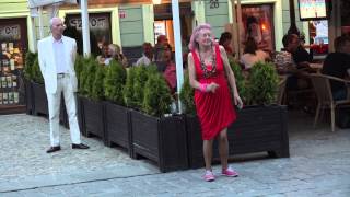 Old and drunk woman dancing in the street [upl. by Ahsikcin]