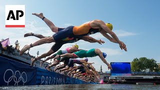 AP photographer explains what its like capturing triathlon swimming [upl. by Eiknarf908]