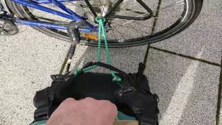 How to attach almost any backpack to your bicycle rack [upl. by Oyek]