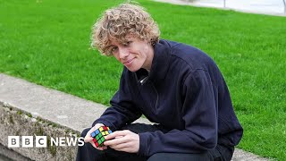 Rubiks cube world champion solves puzzle in seven seconds live on air  BBC News [upl. by Ailedamla]