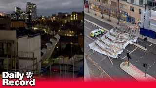 Storm Henk The moment scaffolding falls off back of a building as weather wreaks havoc in London [upl. by Goulet727]