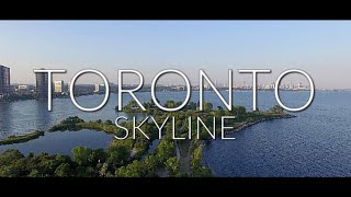 TORONTO SKYLINE FROM LAKE ONTARIO 4K Drone [upl. by Ardnuassac]