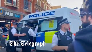 Video appears to show police officer repeatedly hitting an individual in the head in Dalston [upl. by Arua]