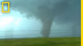 Tornadoes Lightning in Rare Video  National Geographic [upl. by Mackenzie791]