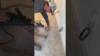 Removing a cracked floor tile video satisfying asmr shorts reels shortvideo constructionhome [upl. by Steffy765]