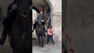 quotCrazy Tourist Disrespectfully Provokes Kings Guard Gets a Gentle Kickquot Shorts [upl. by Ahsinan]