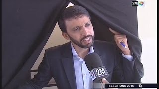 Hicham El Guerrouj au bureau de vote [upl. by Sucitivel]