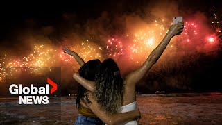 New Years 2023 Copacabana beach sizzles in Rio de Janeiro as fireworks illuminate night sky [upl. by Ardme]