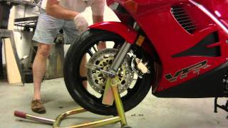 Honda VFR750F Front Wheel Removal [upl. by Esertal]