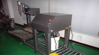 big plastic bucket filling capping machine with drum conveyor system for 420kg paint container [upl. by Nalyt]