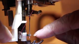 HOW TO USE THE AUTOMATIC NEEDLE THREADER ON A SINGER SEWING MACHINE 4166 tutorial [upl. by Siulegroj]