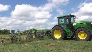 Grassilage 2015  John Deere 6150R Schwadert mit einem Krone Swadro 1400 Sound [upl. by Nomael458]