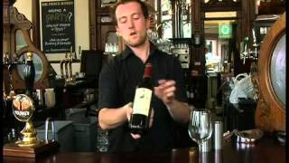 How to open a bottle and serve a glass of wine [upl. by Assilim]