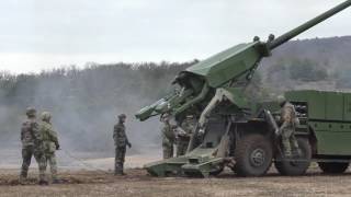 Danish troops firing CAESAR 8x8 selfpropelled artillery system [upl. by Carbo]