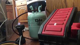 Using homemade refrigerant recovery pump on an LG refrigerator [upl. by Arihday]